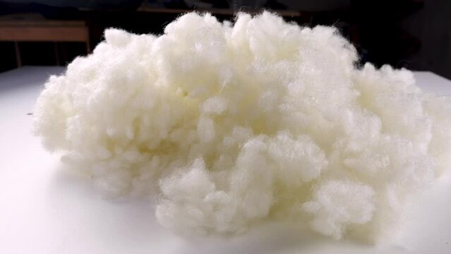 Polyester wadding Sintepon is a nonwoven fabric made of synthetic fibers. Padding or batting when used as a layer in lining quilts or as a packaging or stuffing material