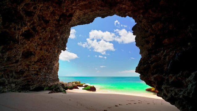 Beautiful view from mountain cave on beautiful tropical beach on nature background 4K