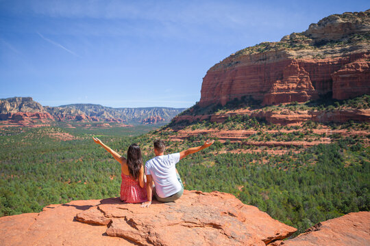 Travel in Devil's Bridge Trail, scenic view panoramic landscape in Sedona, Arizona, USA. Happy Couple on the famous trail in Sedona