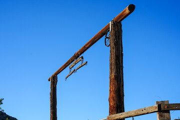 Old west wooden ranch gate at an angle