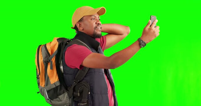 Green screen, travel and black man with phone photography on adventure, journey or happy memory of hiking with backpack. Smartphone, taking pictures and excited tourist trekking on tour or hike
