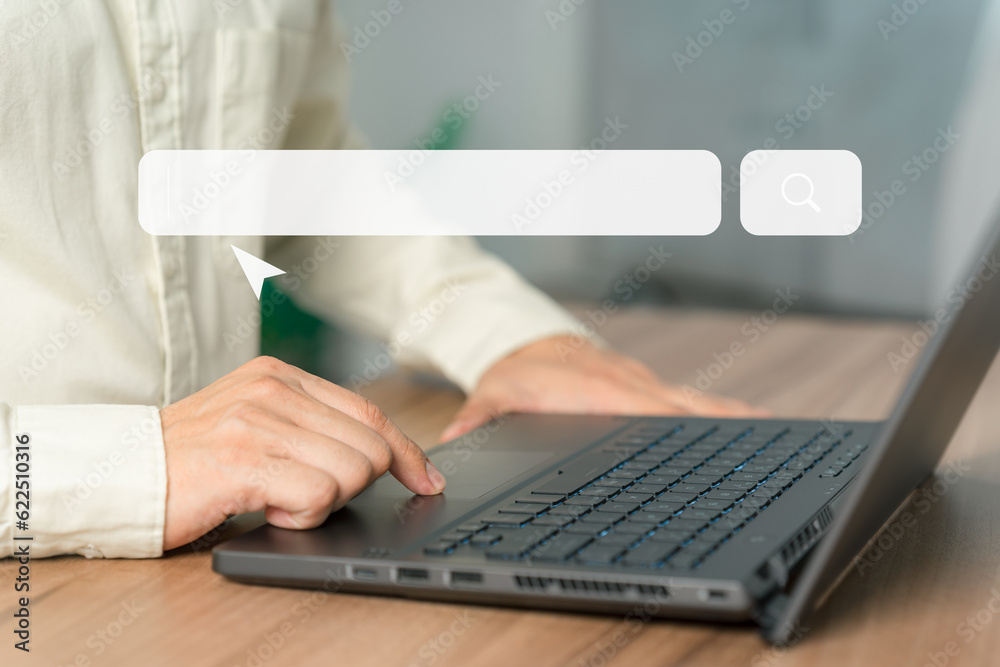 Poster Man working with a laptop computer on the table. Search engine optimization of the internet with the search bar. Best SEO technology networking, Searching browsing internet data information concept.
