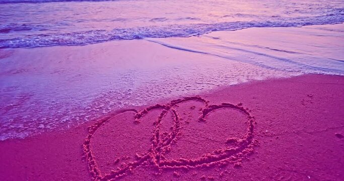 Heart symbol on beach, Hand drawn heart on beach sand over sunset or sunrise sky beautiful light nature landscape,Colorful sand sea background
