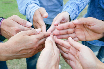 Working people hands meeting corporate symbols Combine the power of quality teamwork and efficient personnel. Organizational development concept in teamwork and business