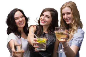 Digital png photo of caucasian female friends holding drinks and smiling on transparent background