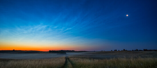 Night landscape with Noctilucent clouds at Lithuania