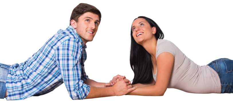 Digital png photo of smiling caucasian couple lying on the floor on transparent background