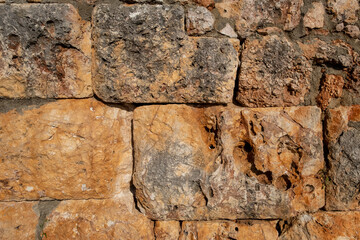 Texture of a stone wall. Old castle stone wall texture background. Stone wall as a background or texture. Part of a stone wall, for background or texture