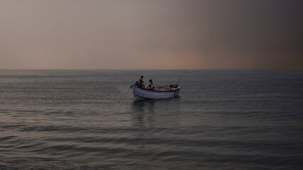 Naklejka premium Beach Landscape Sunrise Sunset People Fishing Thoothukudi