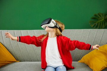 Child in glasses of virtual reality