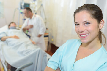 Obraz premium portrait of attractive female nurse in patients room
