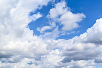 Naklejka na ściany i meble Blue sky and white clouds. Beauty of nature 