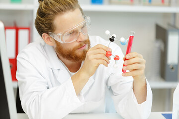 man medical researcher working in laboratory