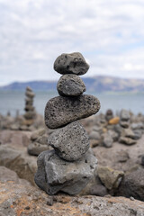 Obraz na płótnie Canvas Stack of stones at embankment in Reykjavik, Iceland