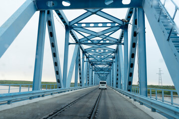 Fototapeta na wymiar a car in iron bridge