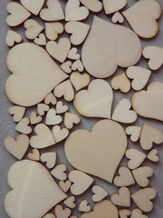 valentine's day greeting card-wooden hearts on a gray suede background