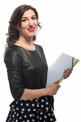 Portrait of Positive and Smiling Mature Caucasian Business Woman in Dark Dress With Colorful Folders Against White