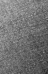 Closeup of Black Jeans Fabric Texture with Selective Focus