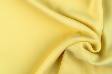 Yellow color fabric cloth polyester texture and textile background.