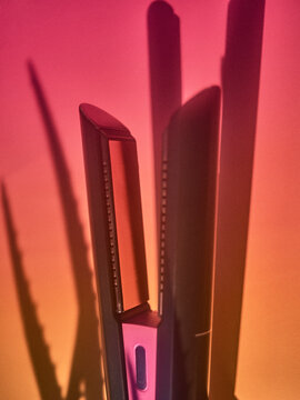 Hair straightener still life, abstract, orange red