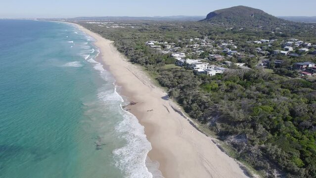 Aerial View Of Yaroomba Beach On Sunshine Coast In Queensland. Mount Coolum In Distant Background. pullback