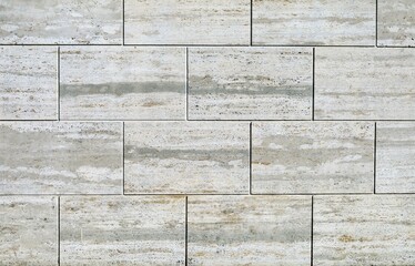 Travertine stone tiles, cladding wall for exterior. Background and texture. 