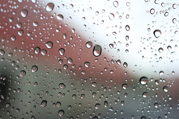 Water drops on glass background texture.  background glass covered with water drops.  bubbles in water