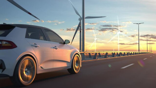 Offshore wind turbines building up behind a generic electric car driving along bridge or coastal highway into the sunset. Expansion of renewable energies. Wind farm construction. Green energy concept