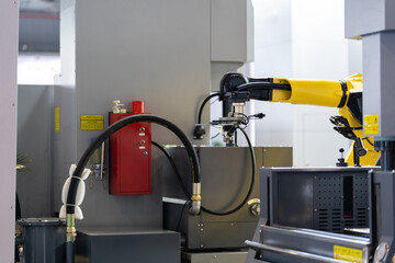 robot arm working in factory