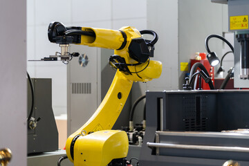 robot arm working in factory