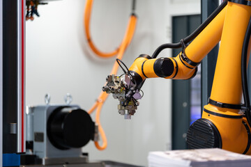 robot arm working in factory