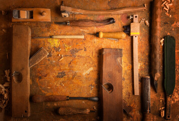 Fototapeta na wymiar Hand tools Wood on an old wooden workbench