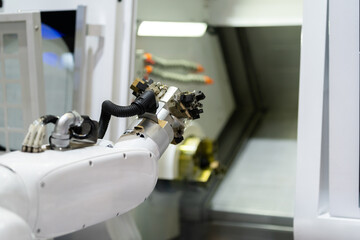 robot arm working in factory