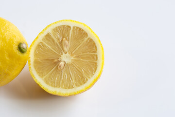 Ripe lemons on white background.
