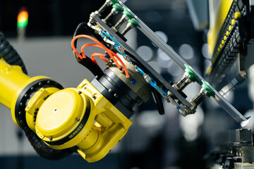 robot arm working in factory