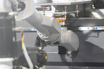 robot arm working in factory
