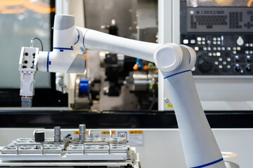 robot arm working in factory