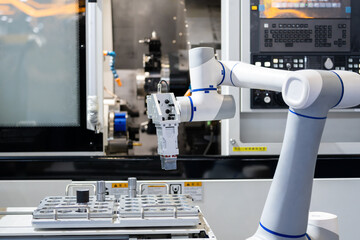 robot arm working in factory