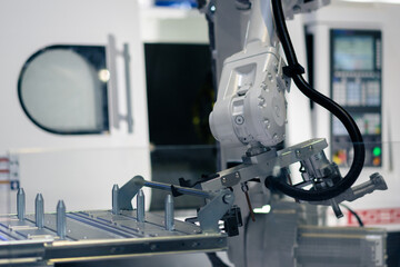 robot arm working in factory