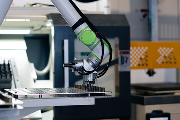 robot arm working in factory