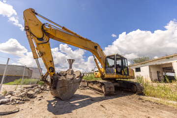 Crawler excavator on demolition site.
