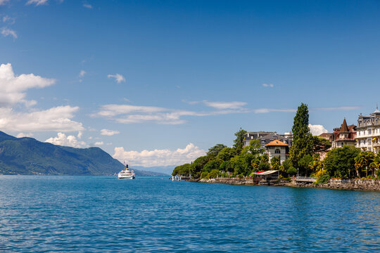 Montreux Riviera on a beautiful summer day with a steamboat in Lake Geneva