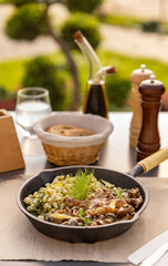 Stewed mushrooms on restaurant table