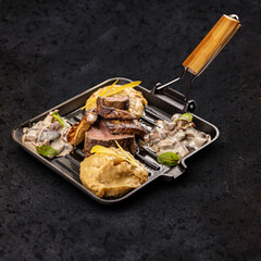 Roasted pork medallions with grilled duck liver