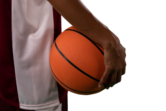Digital png photo of biracial male basketball player with basketball on transparent background