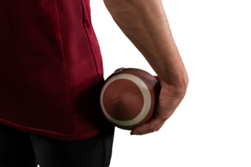 Digital png photo of buttocks biracial rugby player holding ball on transparent background
