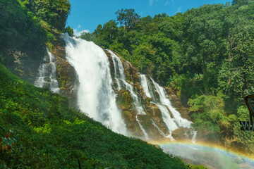 A Portrait of Tranquility with a Subtle Rainbow at Wachirathan Waterfall, Doi Inthanon National Park, Thailand