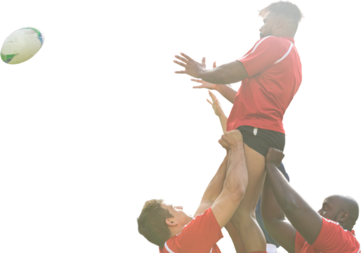 Digital png photo of diverse male rugby players catching ball on transparent background