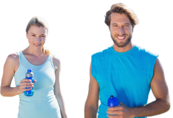 Digital png photo of caucasian sports couple with bottles of water on transparent background
