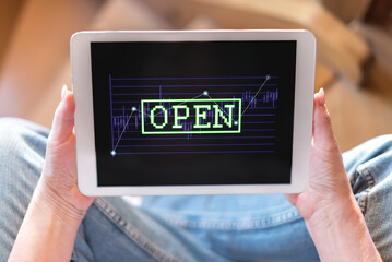 Open stock market concept on a tablet